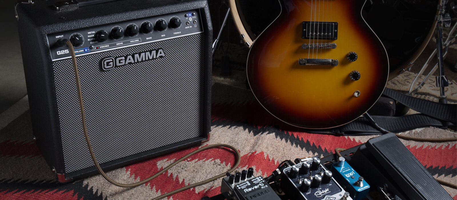 GAMMA G25 guitar amp hooked up to guitar pedals next to guitar