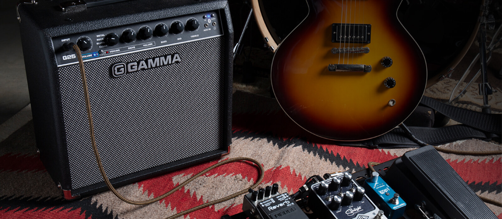 GAMMA G25 guitar amp hooked up to guitar pedals next to guitar