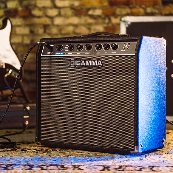 G50 guitar amp on small stage with guitar