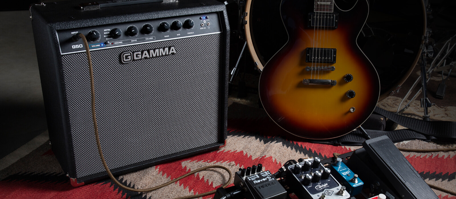 GAMMA G50 guitar amp next to pedal board and guitar