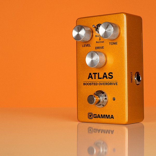 Gamma Atlas boosted overdrive pedal standing left in orange space.