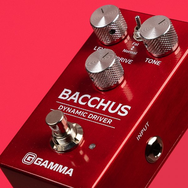 Gamma Bacchus dynamic driver pedal angled left on red background.