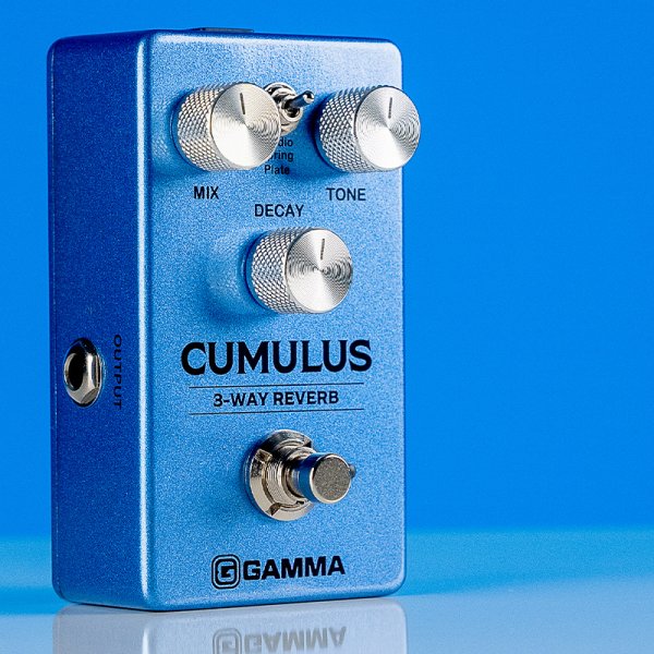Gamma Cumulus 3-way reverb pedal in blue space standing right on the table.