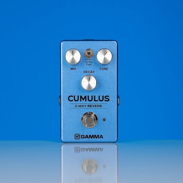 Gamma Cumulus 3-way reverb pedal in blue space standing on the table.
