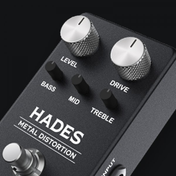 Gamma Hades metal distortion pedal floating on dark background knob close up.
