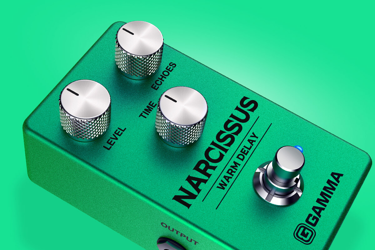 Gamma Narcissus warm delay pedal floating on green background close up.
